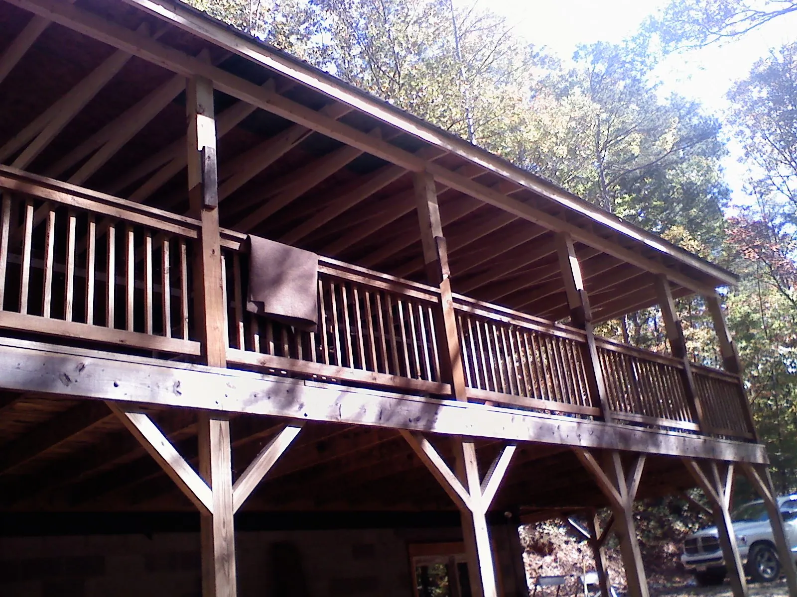 Timber framing under a new elevated porch and deck — Roof Leak Repair in Spring Hope by Roofing Brothers